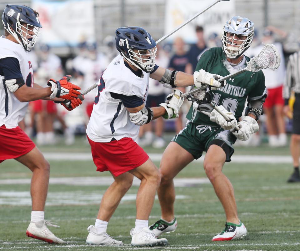 Pleasantville's Daniel Picart (10) fires a shot against Cold Spring Harbor during the boys lacrosse state Class D semifinal at Ford Field on the campus of the University at Albany June 9, 2023. 