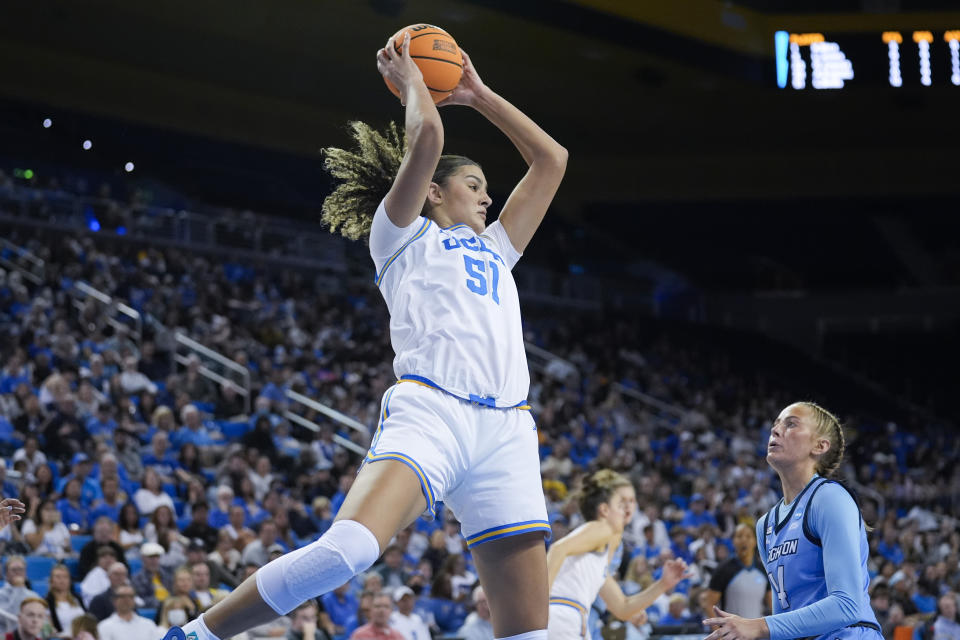 UCLA center Lauren Betts (51) grabs a rebound during the first half of a second-round college basketball game against Creighton in the women's NCAA Tournament Monday, March 25, 2024, in Los Angeles. (AP Photo/Marcio Jose Sanchez)
