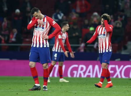 Soccer Football - Copa del Rey - Round of 16 - Second Leg - Atletico Madrid v Girona - Wanda Metropolitano, Madrid, Spain - January 16, 2019 Atletico Madrid's Antoine Griezmann and team mates react after conceding their third goal scored by Girona's Seydou Doumbia REUTERS/Sergio Perez