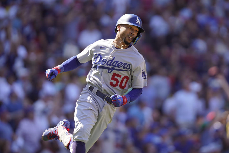 Los Angeles Dodgers' Mookie Betts runs the bases after hitting a two-run home run in the sixth inning of a baseball game against the Boston Red Sox, Sunday, Aug. 27, 2023, in Boston. (AP Photo/Steven Senne)