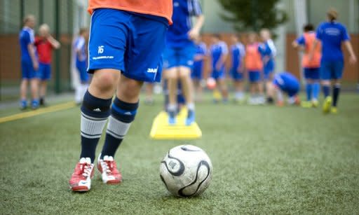 Girls from a specialised school for competitive sports are seen during a training session in Potsdam, northeastern Germany, in 2011. Germany's future Steffi Grafs and Dirk Nowitzkys may not have the same chance to become world-class athletes because of longer school hours that have cut into afternoon sports, officials worry