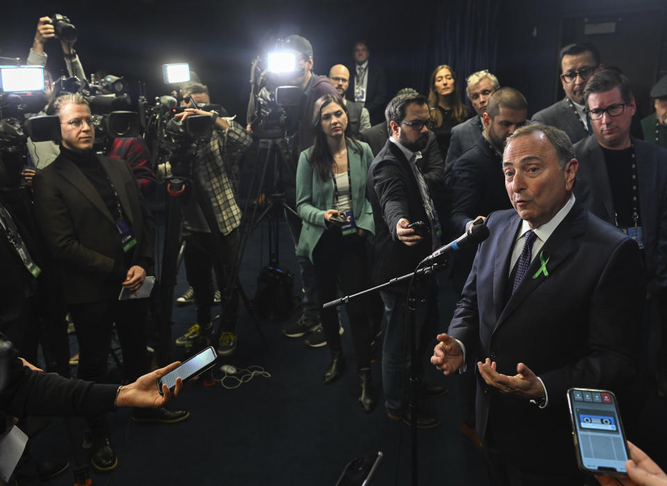 NHL commissioner Gary Bettman speaks during a news conference prior to an NHL hockey game between the Montreal Canadiens and Boston Bruins in Montreal, Tuesday, Jan. 24, 2023. (Graham Hughes/The Canadian Press via AP)