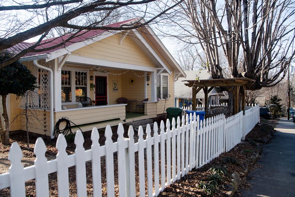 Two Greybeard vacation rentals listed within Asheville's city limits — located on a block between Flint Street and Woodlawn Avenue — are conforming to city rules by renting for a whole month as vacation rentals on the Greybeard Rentals website rather than just for a few days.