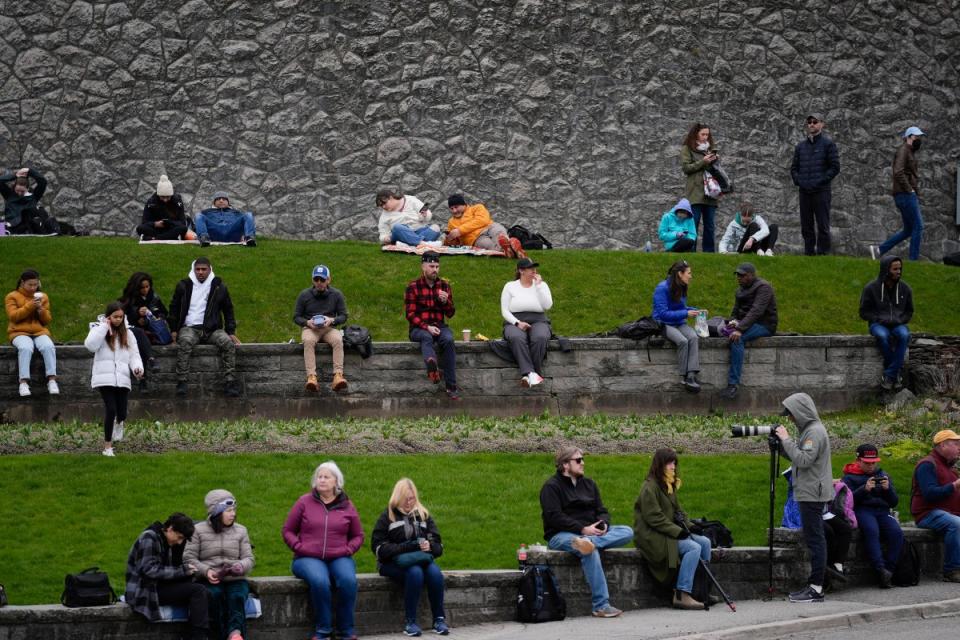 People gather under overcast skies in anticipation of watching the total solar eclipse from Niagara Falls, Ontario.<span class="copyright">Matt Rourke—AP</span>