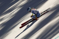 United States' Mikaela Shiffrin speeds down the course during an alpine ski, women's World Championships super G, in Meribel, France, Wednesday, Feb. 8, 2023. (AP Photo/Gabriele Facciotti)