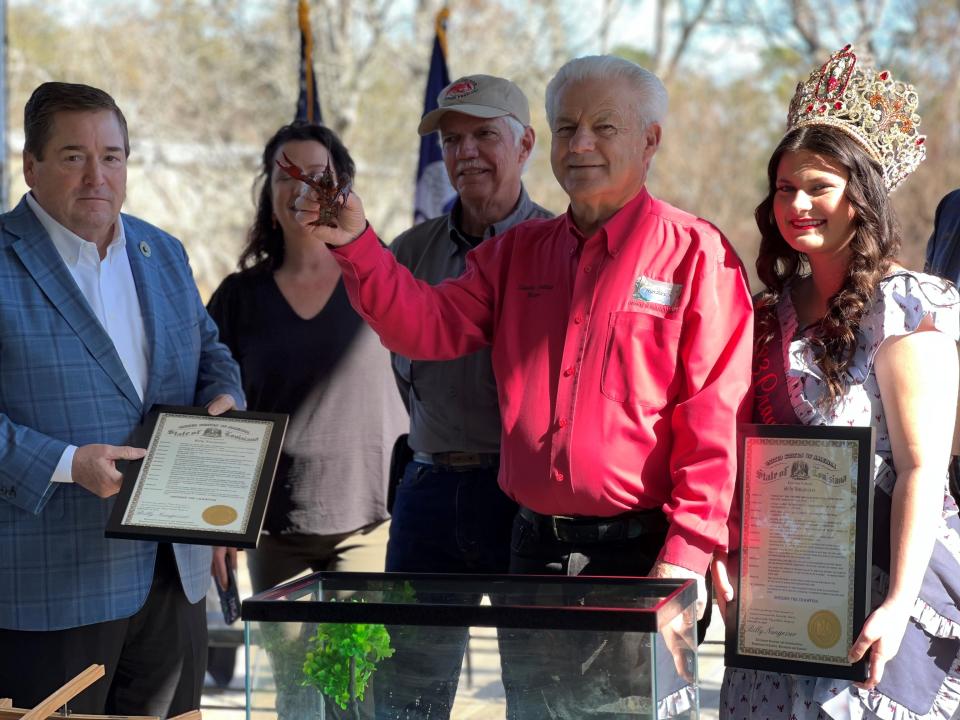 8th annual pardoning of the crawfish: (Left to right) Lt. Gov. Billy Nungesser, Mayor Sherbin Collette, Crawfish Queen 2023 Bree Guidry