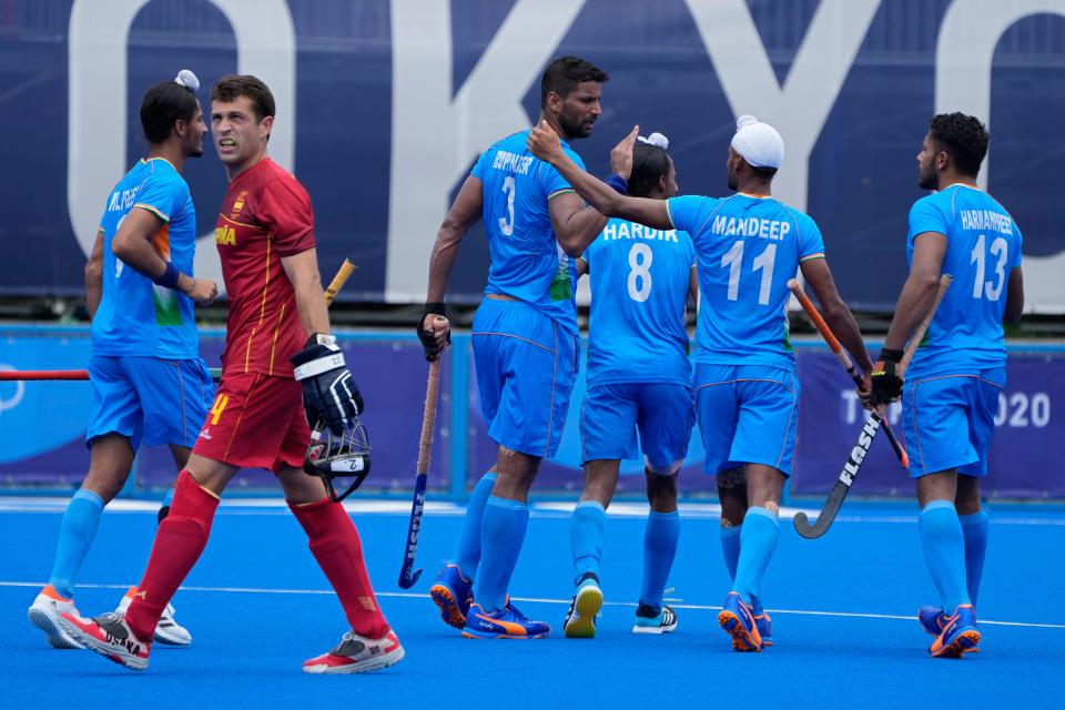 India's Rupinder Pal Singh (3) celebrates after scoring against Spain during a Men's hockey group stage match in Tokyo on Tuesday, 27 July (AP)