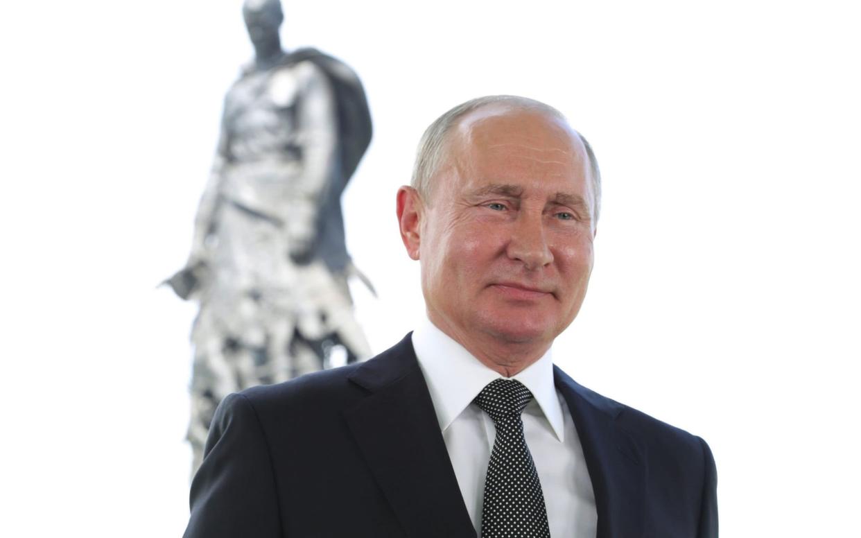 Vladimir Putin recorded his televised address near a monument in Russia's Tver region - Mikhail Klimentyev/Sputnik via AFP