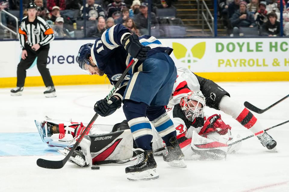 Jan 19, 2024; Columbus, Ohio, USA; New Jersey Devils goaltender Vitek Vanecek (41) makes a toe save on a shot from Columbus Blue Jackets right wing Justin Danforth (17) during the third period of the NHL hockey game at Nationwide Arena. The Blue Jackets lost 4-1.