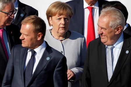 German Chancellor Angela Merkel arrives for a family photo during the Asia-Europe Meeting (ASEM) summit just outside Ulaanbaatar, Mongolia, July 16, 2016. REUTERS/Damir Sagolj