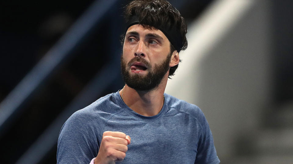 Nikoloz Basilashvili won the Qatar Open after defeating Roger Federer in the early rounds. (Photo by Mohamed Farag/Getty Images)