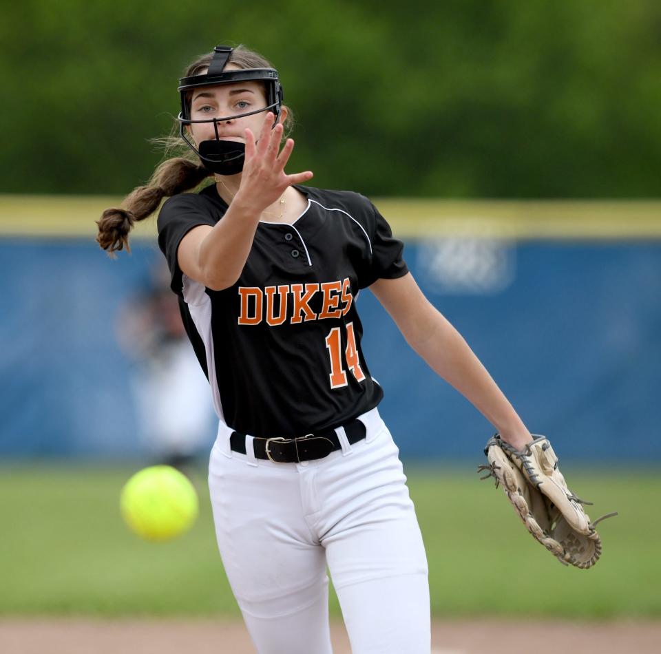 Marlington's Justine Doringo delivers a first-inning pitch vs. Gilmour Academy in a district semifinal, Tuesday, May 14, 2024, at Hubbard High School.
