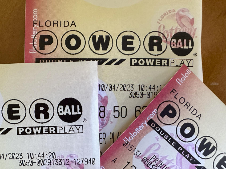 FILE - Powerball lottery tickets are displayed Oct. 4, 2023, in Surfside, Fla. Someone in Michigan has won an $842.4 million Powerball jackpot on the first day of 2024, the first time it has been won on New Year’s Day since the game’s start in 1992. (AP Photo/Wilfredo Lee, File)