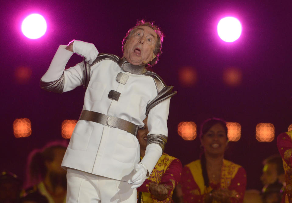 British comedian Eric Idle performs during the closing ceremony of the 2012 London Olympic Games at the Olympic stadium in London on August 12, 2012.     AFP PHOTO / ADRIAN DENNIS        (Photo credit should read ADRIAN DENNIS/AFP/GettyImages)