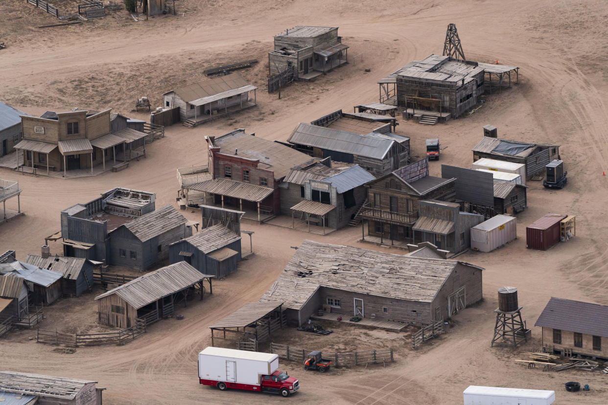 FILE - The Bonanza Creek Ranch, where the film "Rust" was being filmed, appears in Santa Fe, N.M. on  Oct. 23, 2021. Attorneys for the family of cinematographer Halyna Hutchins, who was shot and killed on the set of the film “Rust,” say they're suing Alec Baldwin and the movie’s producers for wrongful death. (AP Photo/Jae C. Hong, File)