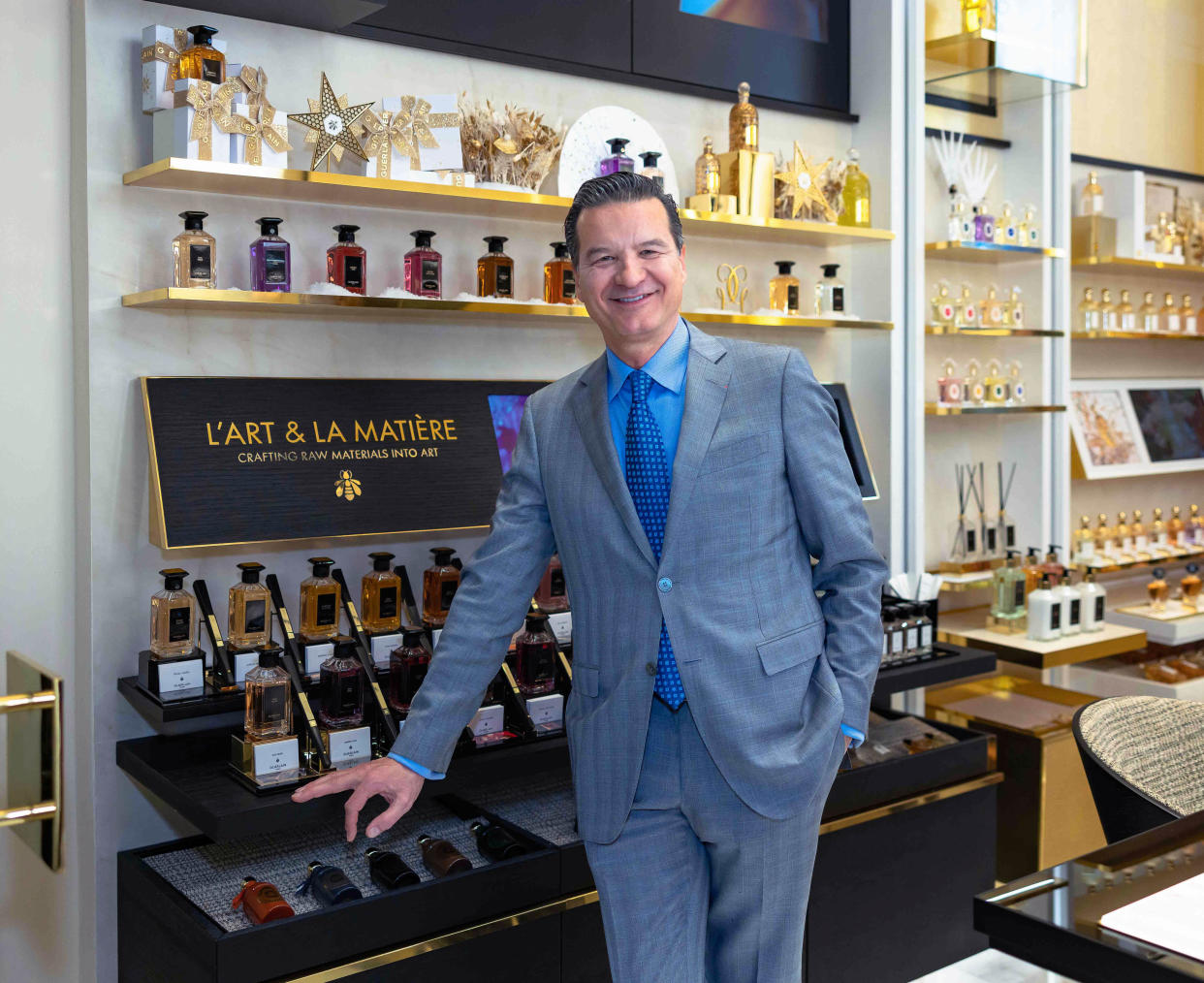 Thierry Wasser, Guerlain's master perfumer, stands inside the store at The Breakers on Dec. 9. The resort and the cosmetics company have celebrated 25 years together with a redesigned boutique.