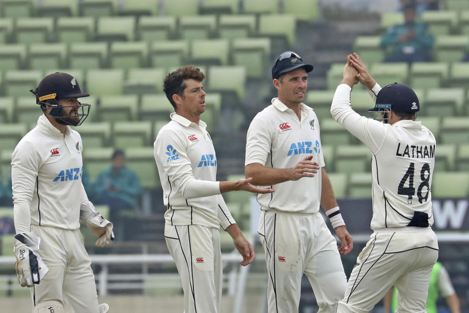 New Zealand Players celebrate the dismissal of Bangladesh's Mushfiqur Rahim during the fourth day of the second test cricket match between Bangladesh and New Zealand in Dhaka, Bangladesh, Saturday, Dec. 9, 2023. (AP Photo/Mosaraf Hossain)