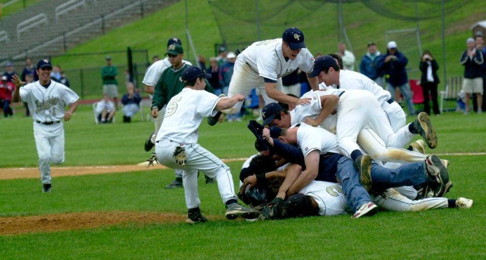 Demarest, N.J. 5/31/2004 -- Bergen County baseball final at Northern Valley/Demarest. Old Tappan players celebrating their Bergen County championship after sophomore Nick Vallillo fired a five-hit shutout to beat St. Joseph on Monday. DON SMITH/THE RECORD