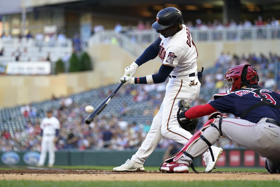 Minnesota Twins' Nick Gordon hits a two-run double during the first inning of the team's baseball game against the Boston Red Sox, Tuesday, Aug. 30, 2022, in Minneapolis. (AP Photo/Abbie Parr)