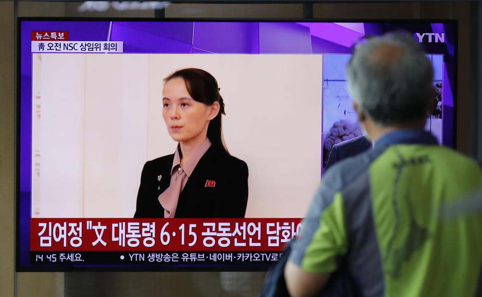 A man watches a TV screen showing a news program with a file image of Kim Yo Jong, the sister of North Korea's leader Kim Jong Un, at the Seoul Railway Station in Seoul, South Korea, Wednesday, June 17, 2020. North Korea said Wednesday that it will send soldiers to now-shuttered inter-Korean cooperation sites in its territory and reinstall guard posts and resume military exercises at front-line areas, nullifying tension-reducing deals reached with South Korea just two years ago. (AP Photo/Lee Jin-man)