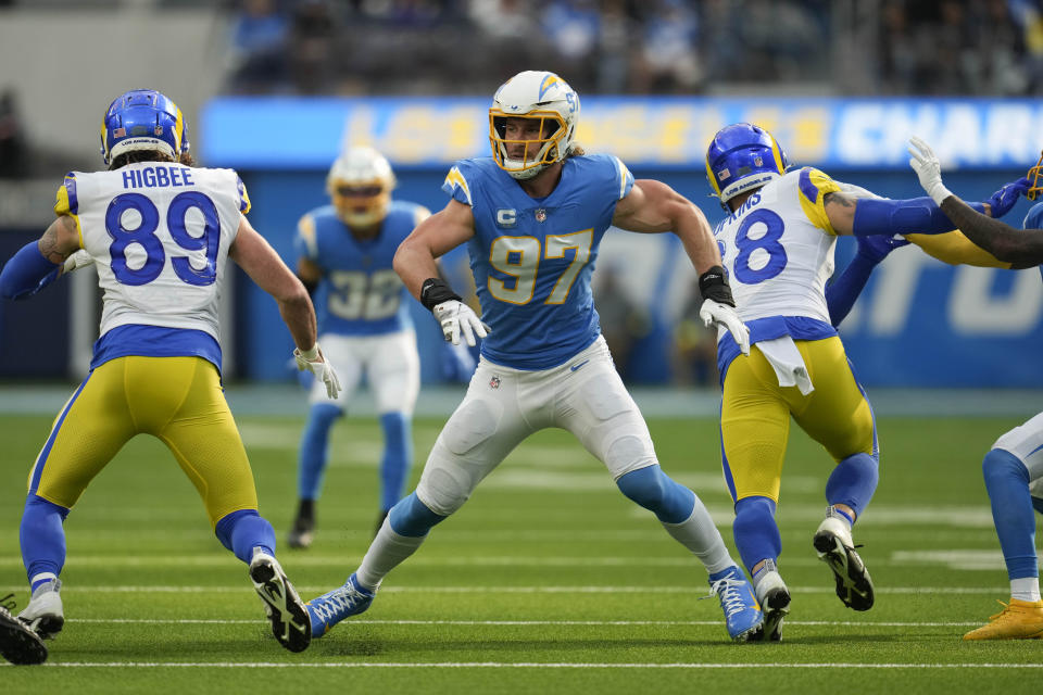 Los Angeles Chargers linebacker Joey Bosa (97) runs up the field during the first half of an NFL football game against the Los Angeles Rams Sunday, Jan. 1, 2023, in Inglewood, Calif. (AP Photo/Marcio Jose Sanchez)