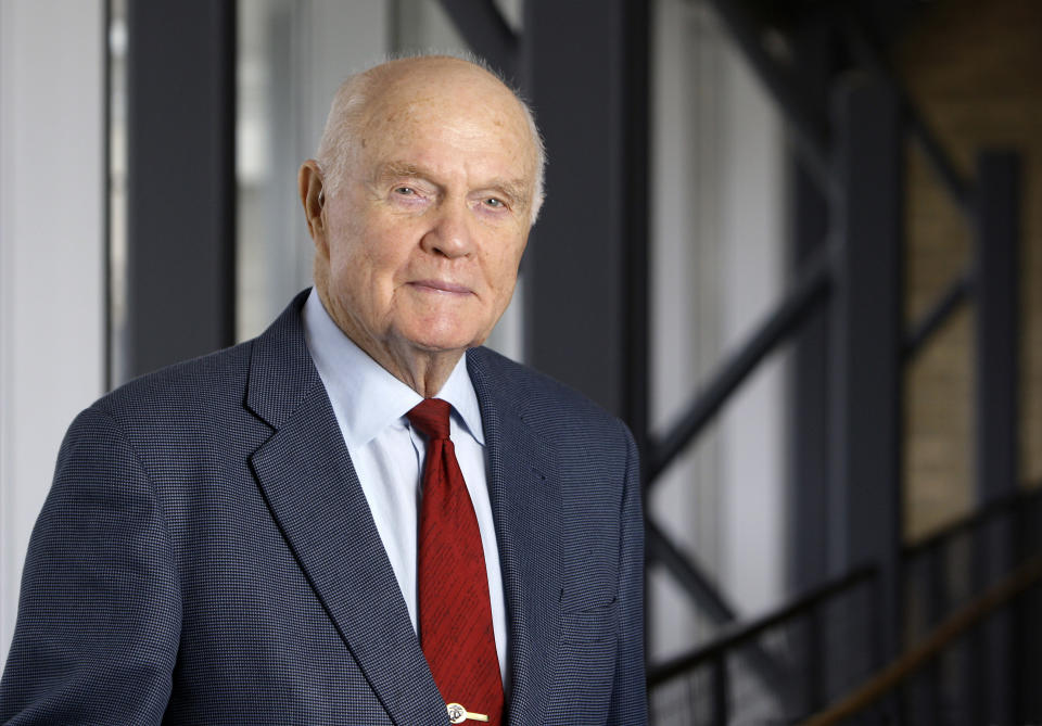 FILE - In this Jan. 25, 2012, file photo, former astronaut and Sen. John Glenn poses for a photo during an interview at his office in Columbus, Ohio. Glenn's birthplace and childhood hometown in Ohio are celebrating what would have been the history-making astronaut and U.S. senator's 100th birthday with a three-day festival from July 16 through July 18, 2021. (AP Photo/Jay LaPrete, File)
