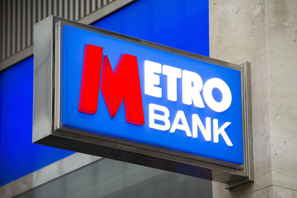 File photo dated 14/02/15 of a Metro Bank sign as founder and chairman Vernon Hill has stepped down with immediate effect following a difficult year for the troubled lender.