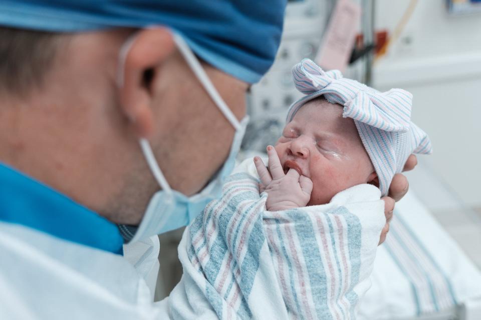 In this file photo, a family takes their first photo after their daughter was born in a new labor and delivery unit at Dell Children's Medical Center of Central Texas.