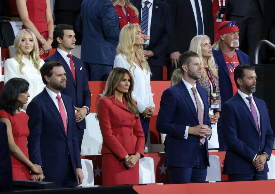 Donald Trump Jr., Eric Trump, former first lady Melania Trump , Republican vice presidential candidate, U.S. Sen. J.D. Vance (R-OH) and Usha Chilukuri Vance  look on during the fourth day of the Republican National Convention at the Fiserv Forum.