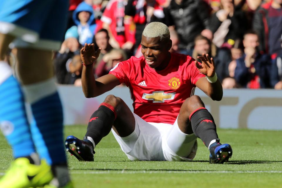 Paul Pogba cannot believe his shot has been saved 