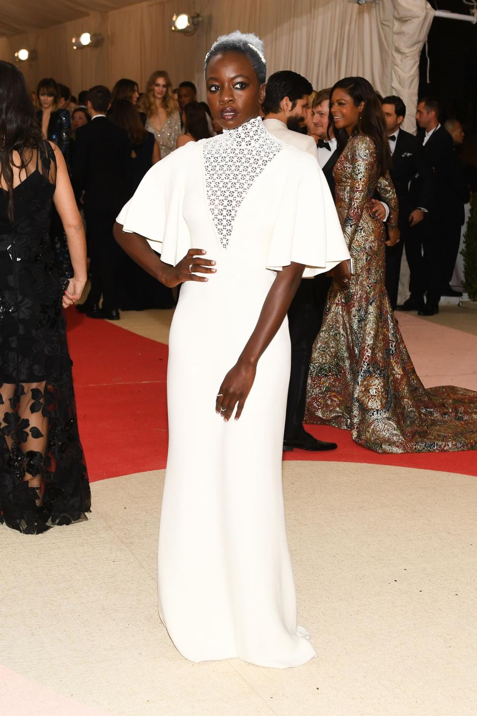 <h1 class="title">Danai Gurira in a Giambattista Valli dress, Monique Péan jewelry, and Fernando Jorge rings</h1><cite class="credit">Photo: BFA.com</cite>