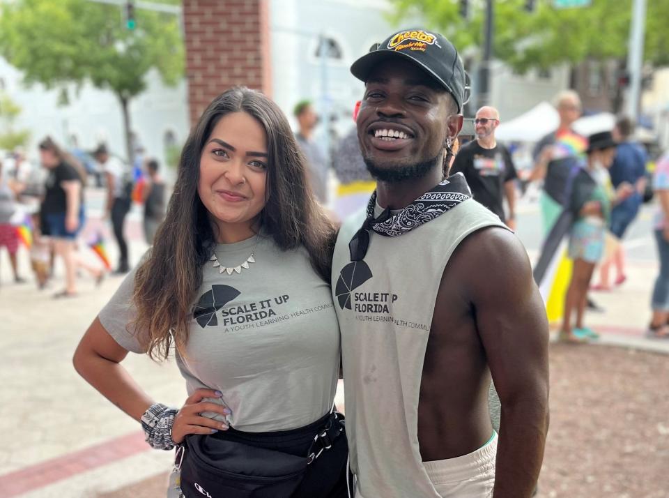 Kristina Feliciano and Avery George wear Scale It Up Florida attire during an event called "Pride in the Park" at Munn Park in Lakeland, Florida on June 18, 2022.