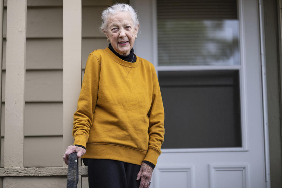 Karin Engstrom, 82, poses for photos at home, Wednesday, Sept. 27, 2023, in Seattle. Engstrom recently had student loans forgiven. She's one of 804,000 borrowers who will have a total of $39 billion forgiven under a one-time adjustment granted by the Biden administration. (AP Photo/Stephen Brashear)