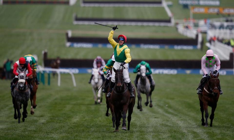 Robbie Power salutes the Cheltenham crowd as Sizing John wins the Gold Cup in March.