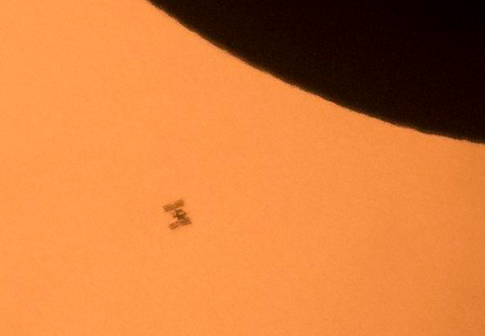 A close-up of the International Space Station in front of the sun (Picture: Joel Kowsky/NASA)