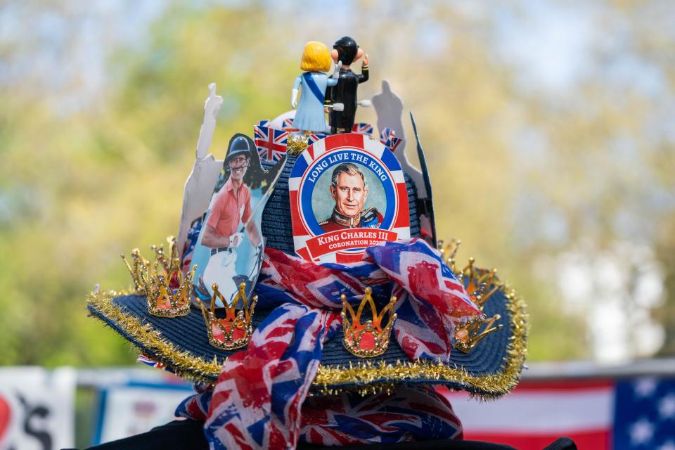 London UK. 4 May 2023. A Royal superfan  from the United States  who has been camping at the Mall dons a  hat decorated hat with royal memorabilia and cutouts with two days left until the coronation at Westminster Abbey, the biggest ceremonial event staged in the capital for 70 years. Credit: amer ghazzal/Alamy Live News