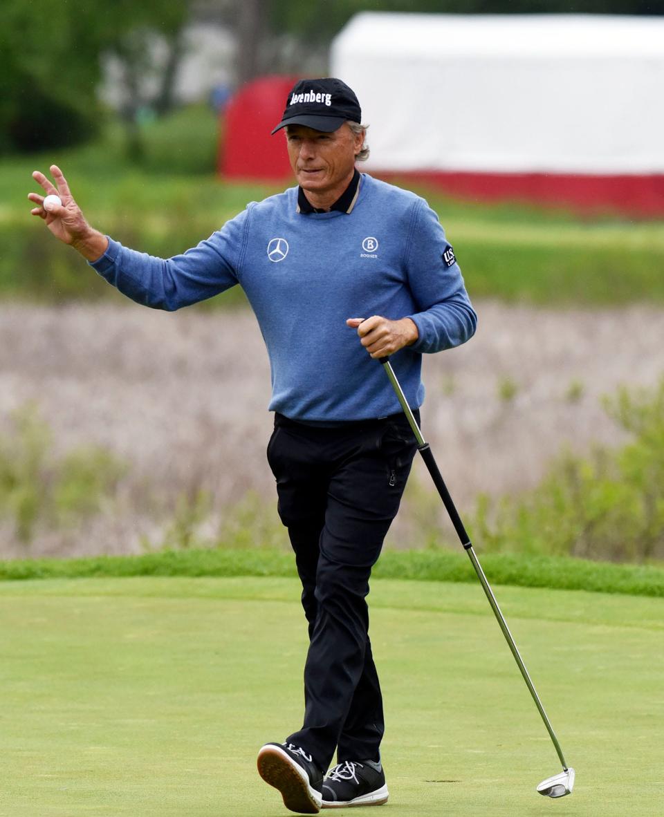Bernhard Langer acknowledges the gallery on the 16th hole during the second round of the Senior PGA Championship golf tournament Friday, May 27, 2022, at Harbor Shores in Benton Harbor, Mich. (Don Campbell/The Herald-Palladium via AP)