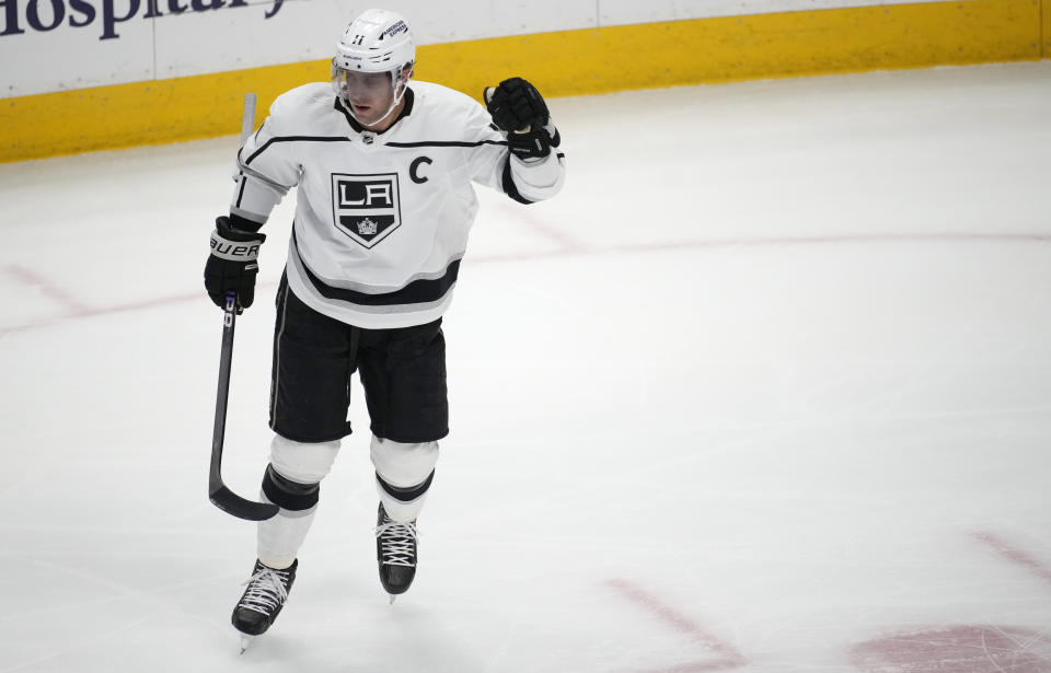 Los Angeles Kings center Anze Kopitar reacts after right wing Adrian Kempe (9) scored a goal against the Colorado Avalanche in the first period of an NHL hockey game Thursday, March 9, 2023, in Denver. (AP Photo/David Zalubowski)