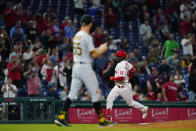 Philadelphia Phillies' Didi Gregorius, right, rounds the bases after hitting a three-run home run against Pittsburgh Pirates pitcher Chasen Shreve during the seventh inning of a baseball game, Friday, Sept. 24, 2021, in Philadelphia. (AP Photo/Matt Slocum)