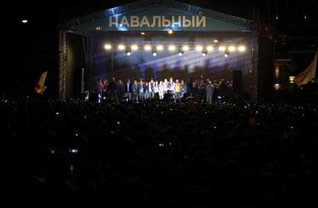 Supporters of Russian opposition leader Alexei Navalny attend a rally in Moscow, September 9, 2013. REUTERS/Maxim Shemetov