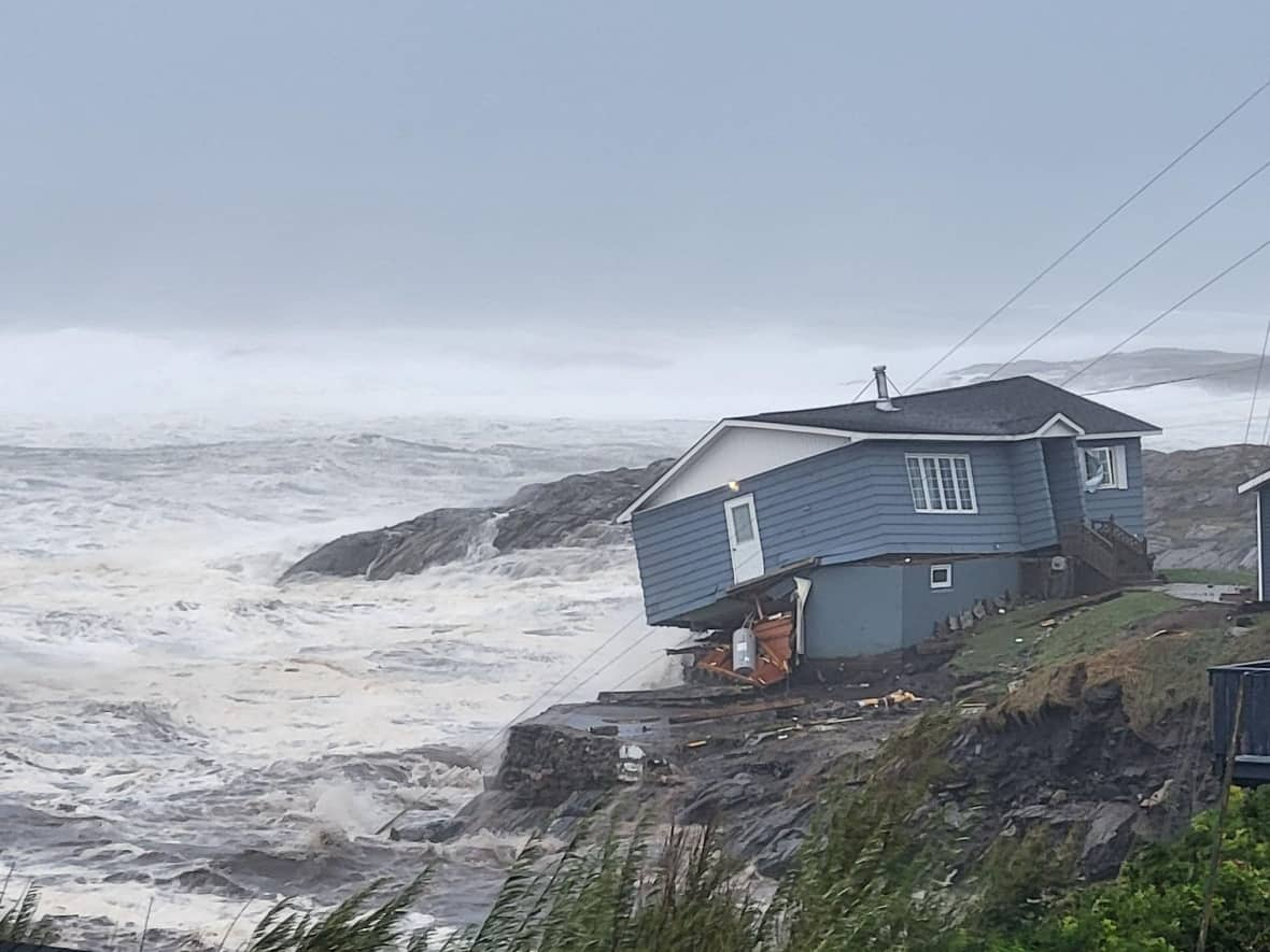 Multiple homes in Port aux Basques have been destroyed due to storm surge. (Rene Roy/Wreckhouse Press - image credit)