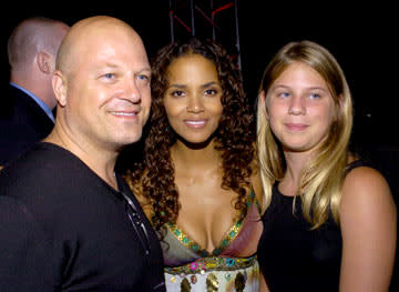 Michael Chiklis and his daughter meet Halle Berry at the Hollywood premiere after-party for Warner Brothers' Catwoman