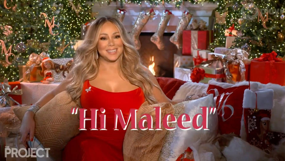 Mariah Carey wearing a red dress on The Project