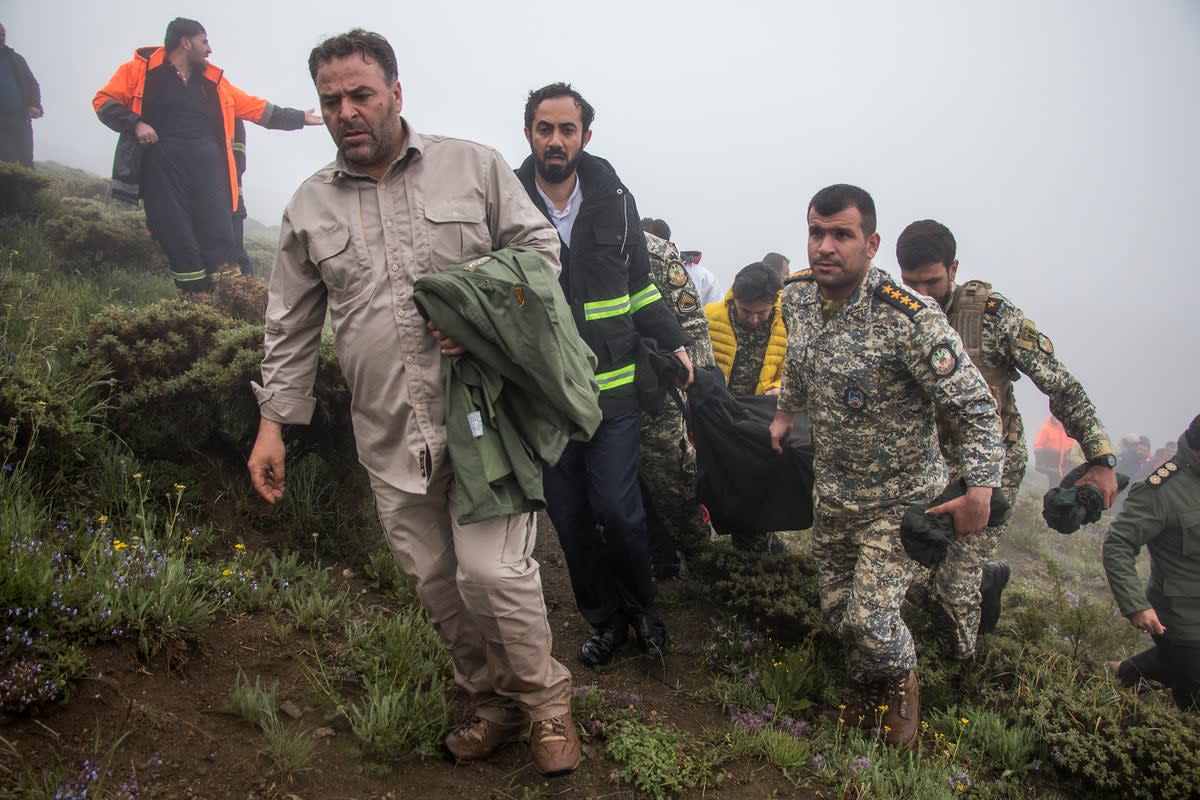 Rescue team at crash site  (MOJ News Agency/AFP via Getty Im)