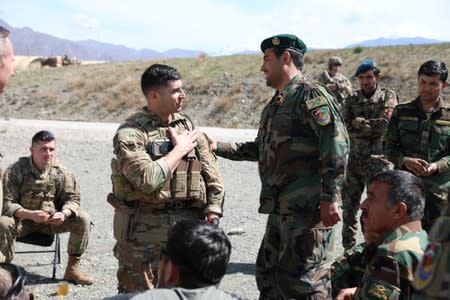 Members of the 2nd Security Force Assistance Brigade advise local forces during their deployment to Afghanistan