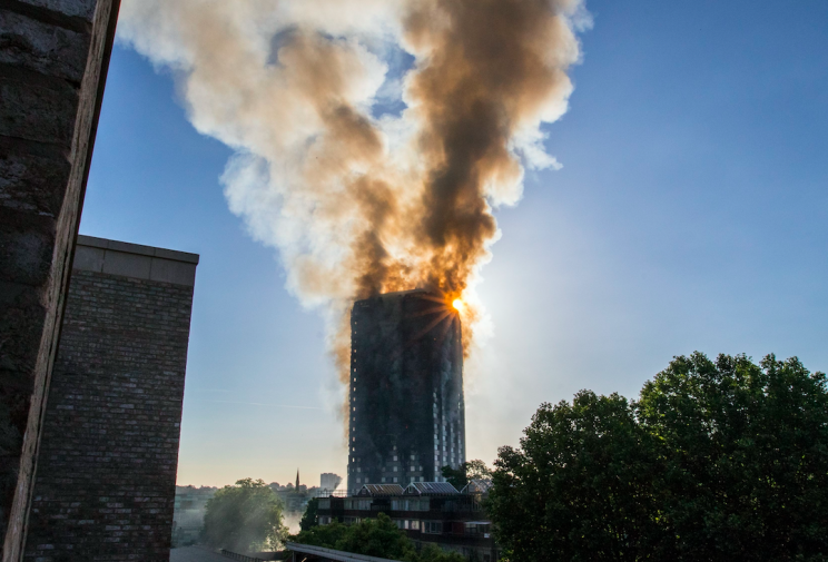 Smoke billowed from the Grenfell Tower on Wednesday morning (Picture: PA)