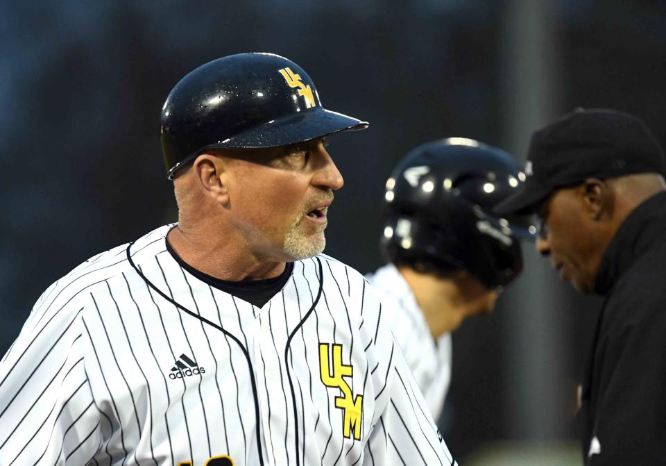 Southern Miss' head coach Scott Berry speakers to his players in the season opener against Purdue on Friday, February 15, 2019. 