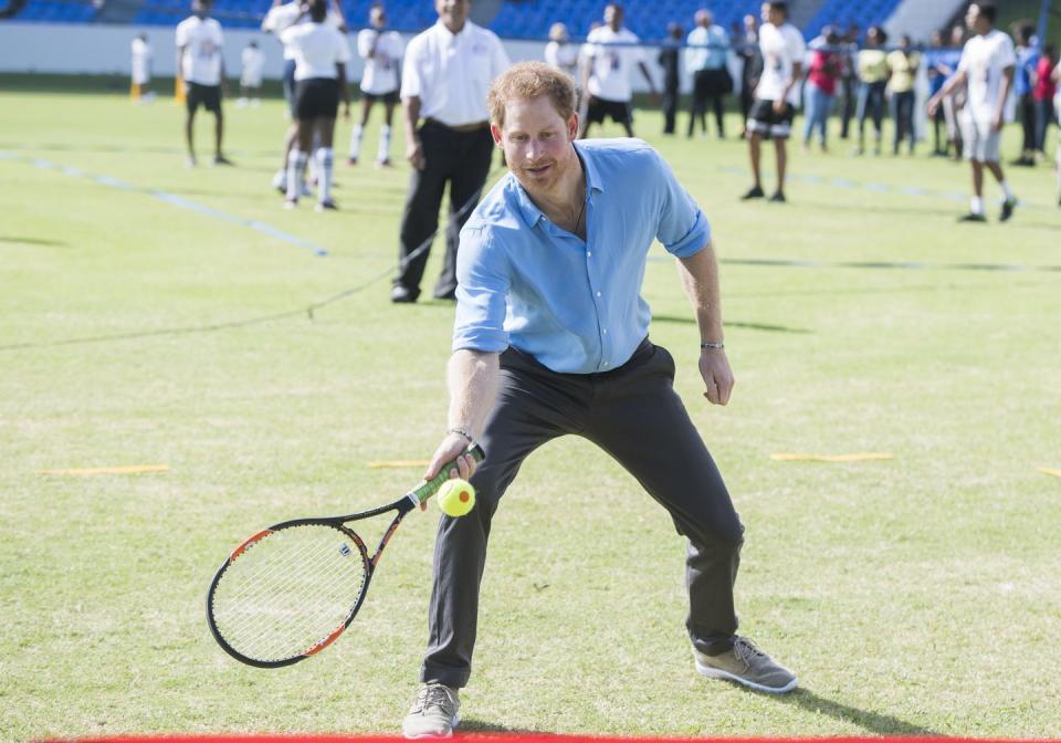 <p>During a Youth Sports Festival during his official visit to Antigua, Antigua and Barbuda, Prince Harry took a swing at a few tennis balls. </p>