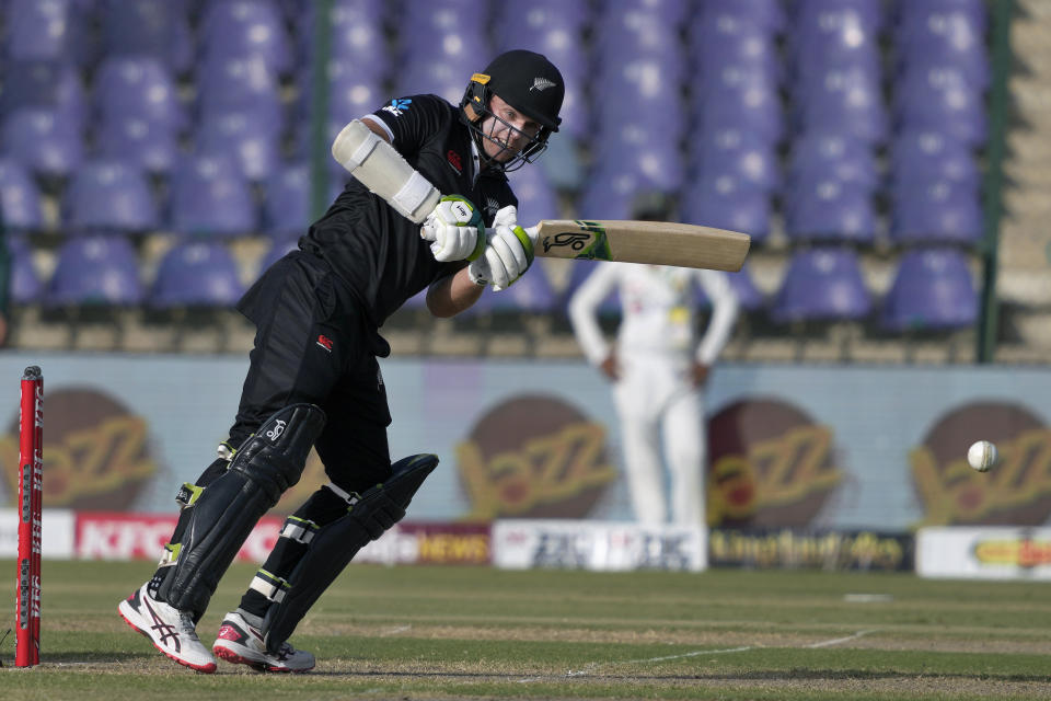 New Zealand's Tom Latham plays a shot during the fifth one-day international cricket match between New Zealand and Pakistan, in Karachi, Pakistan, Sunday, May 7, 2023. (AP Photo/Fareed Khan)