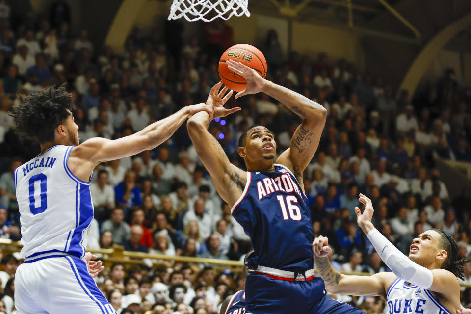 Arizona forward Keshad Johnson (16) shoots against Duke guard Jared McCain (0) during the first half of an NCAA college basketball game in Durham, N.C., Friday, Nov. 10, 2023. (AP Photo/Nell Redmond)